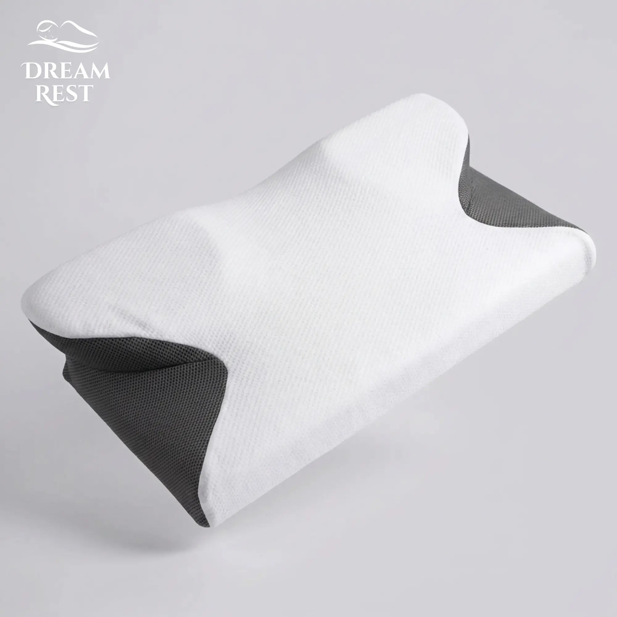 White and black pillowcase bamboo with 'Dream Rest' branding on a light gray background